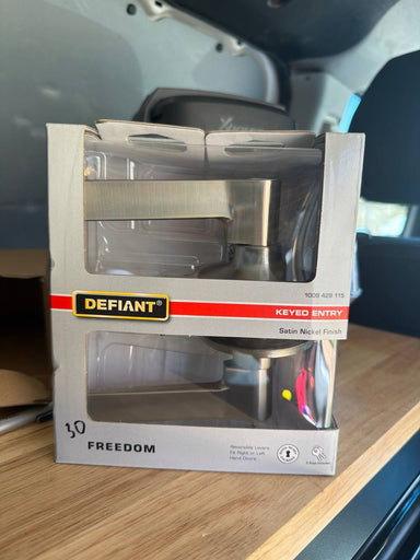 Defiant Freedom front door handle with a key.